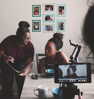 Joenique Rose, left, working as a director on the set of "Log Off," a short film she wrote. It was released in 2018.