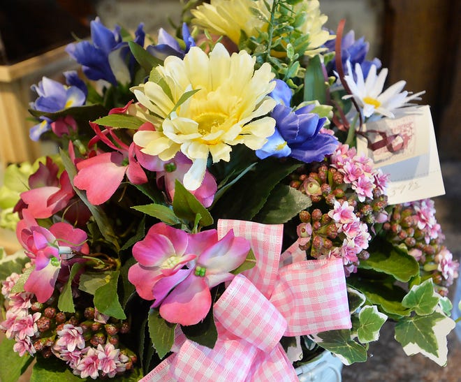 A silk bouquet, typical of a Mother's Day order, is displayed at Gary's Flower Shoppe.