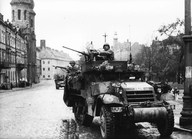A 16th Armored Division half-track in Pilsen, Czechoslovakia, in May 1945.