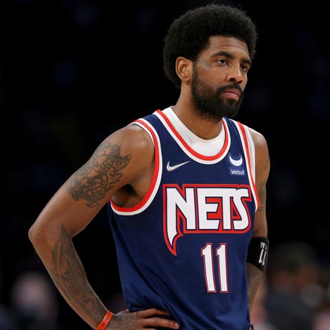 Kyrie Irving reacts during the Nets' Game 4 loss t