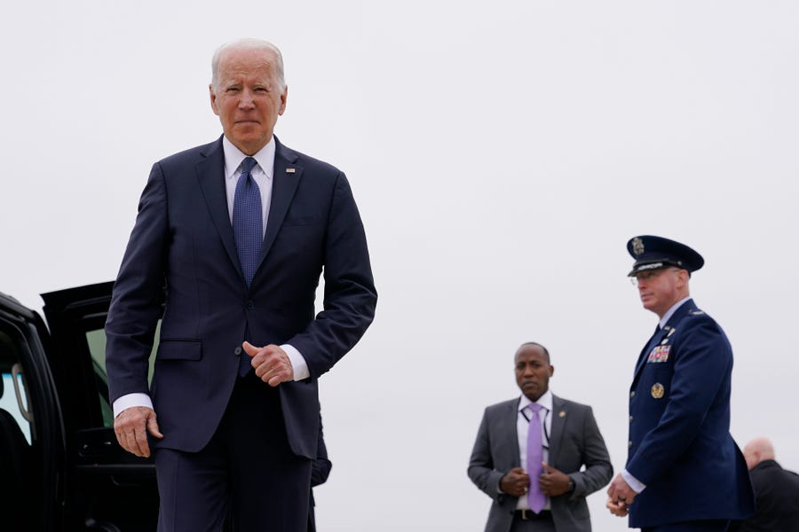 President Joe Biden walks over to speak with members of the press after stepping off Air Force One at Andrews Air Force Base, Md., Monday, April 25, 2022. Biden is returning to Washington after spending the weekend at his home in Delaware. (AP Photo/Patrick Semansky) ORG XMIT: MDPS106