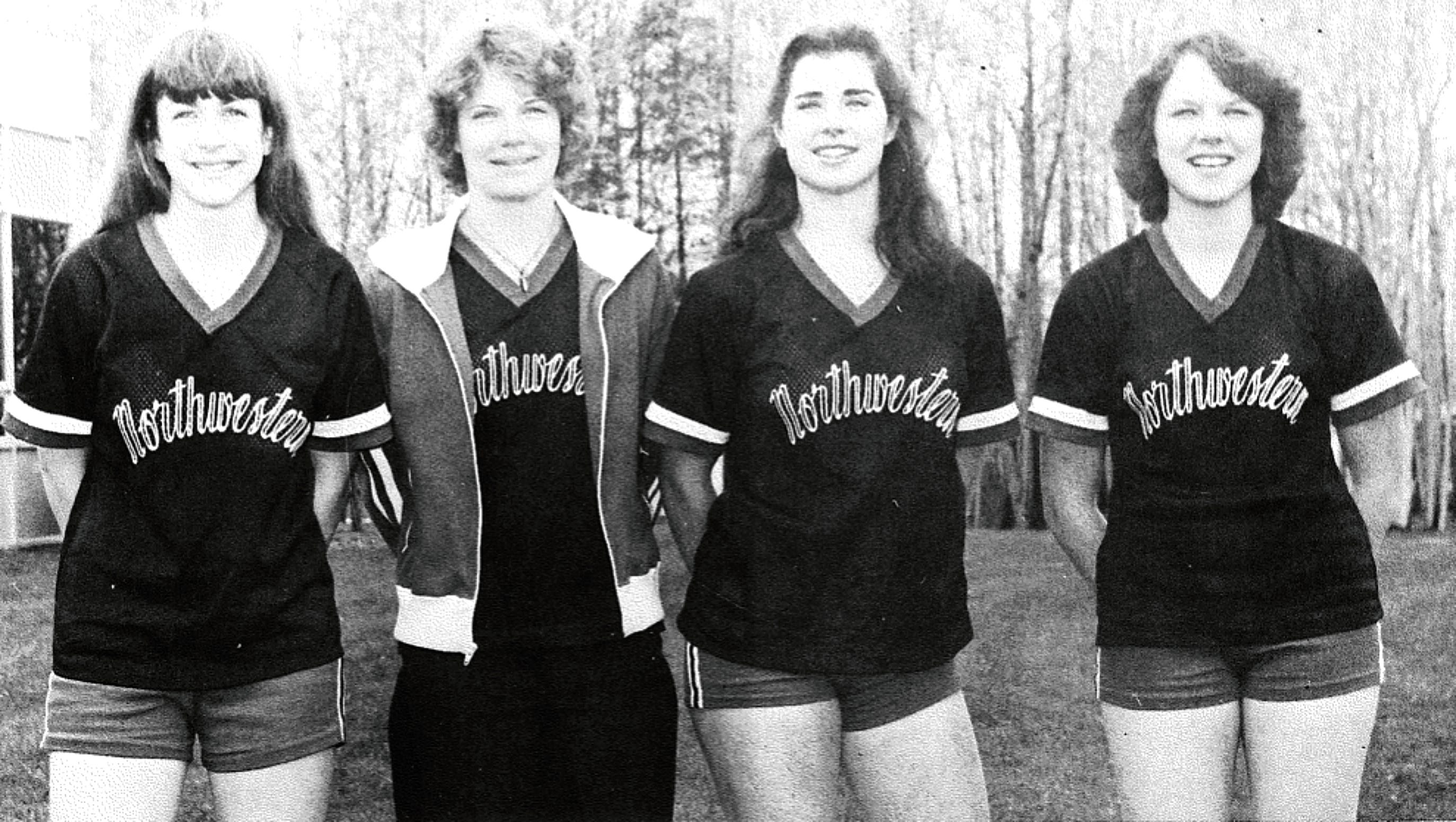 Coach Sue Fargo, second from left, is pictured with student-athletes, from left to right, Terry Bartko, Sally Andrews and Pam Woytek in this 1980 Northwestern yearbook photo.