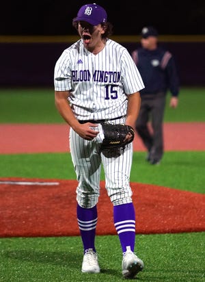 Bloomington South’s Nico Walters (15) celebrates after the last strikeout of the game against Bloomington North at South Tuesday evening.