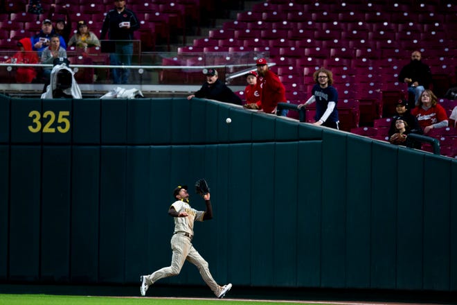 San Diego Padres right fielder Wil Myers (5) catches a fly ball in the fifth inning of the MLB baseball game between Cincinnati Reds and San Diego Padres at Great American Ball Park in Cincinnati on Tuesday, April 26, 2022. San Diego Padres defeated Cincinnati Reds 9-6.