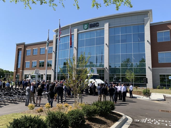 IMC Companies holds a ribbon cutting ceremony for the new corporate headquarters in Collierville on April 27, 2022. Mark George founded IMC Company in 1982 to provide services including marine drayage, expedited services, truck brokerage, warehousing and more.