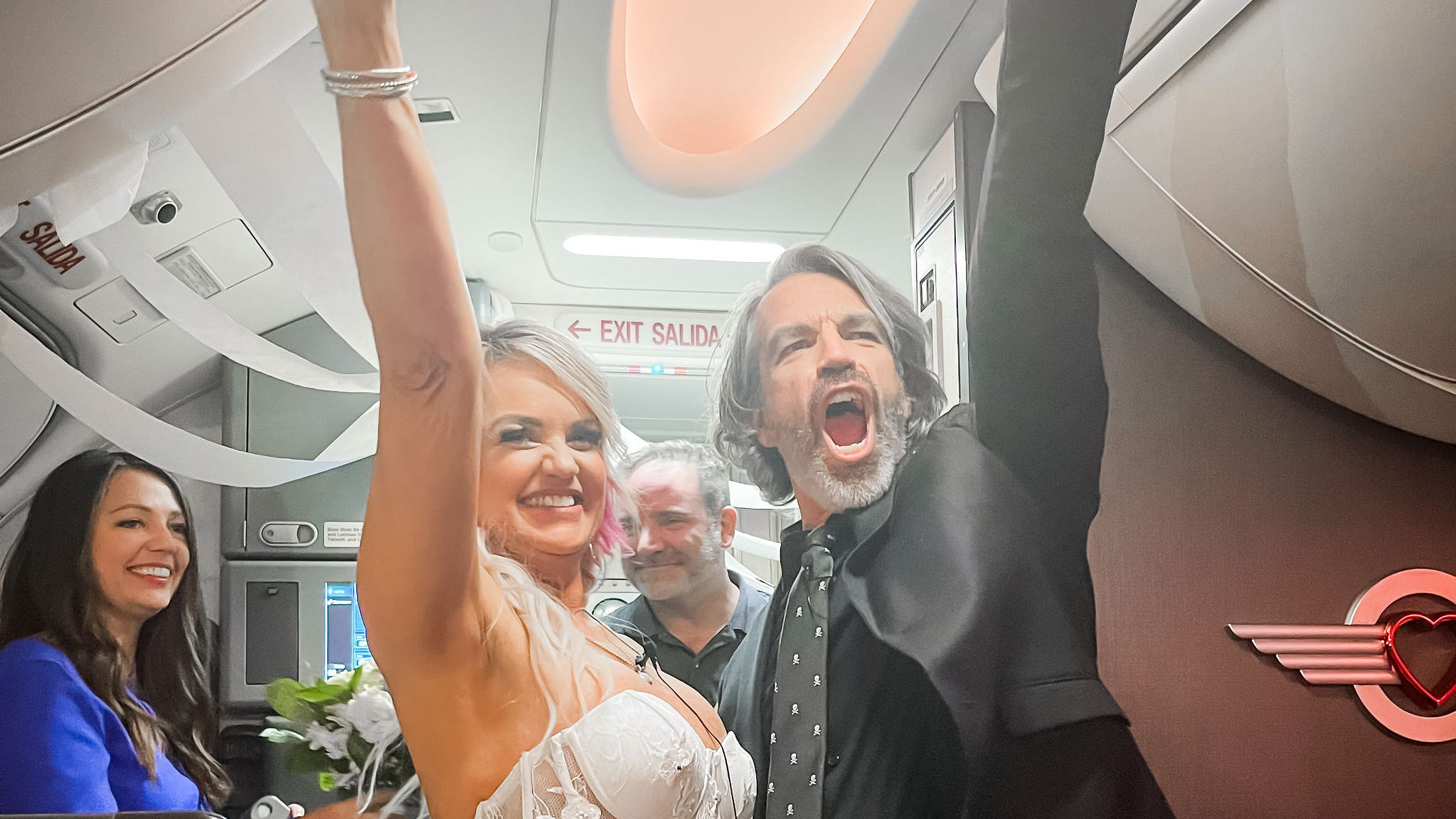 Their Vegas wedding wasn't going to happen. So they got married on a plane to Phoenix