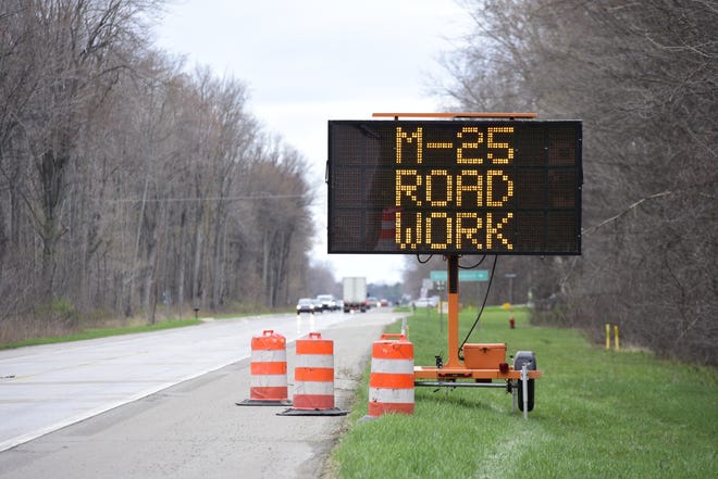 Road work sign on M-25 near Lakeport in Sanilac County on Tuesday, April 26, 2022. Road work on M-25 from Fisher to Mortimer Line roads is slated to begin Monday, May 2.