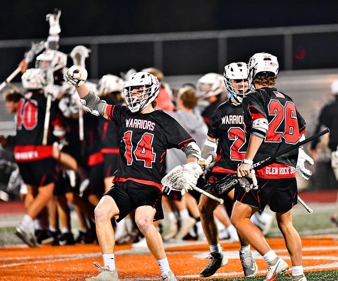 Susquehannock celebrates a 10-9 overtime win over Central York during boys' lacrosse action at Central York High School in Springettsbury Township, Tuesday, April 26, 2022. Dawn J. Sagert photo