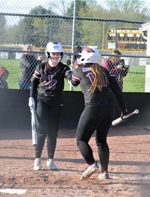 John Glenn's Alivia Boothe (10) scores and celebrates with teammate Sarah Wayne during a 5-3 win over Tri-Valley in a MVL Big School Division clash on Wednesday.