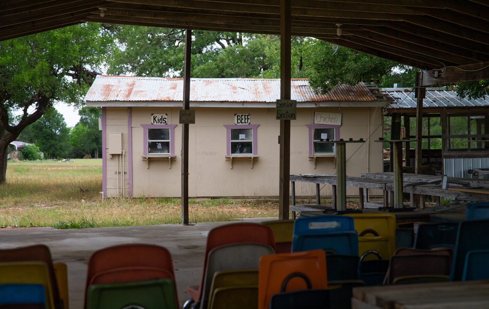 A pavilion and food serving building near the St. John Colony School are used every year for the historic Juneteenth celebration. The signs at the serving windows read: u0022Beef ... Chicken ... Kids.u0022