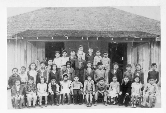Lauro Cavazos (front row, third from right) poses with classmates in an elementary school class photo from the mid-1930s near the Santa Gertrudis Division of the King Ranch.