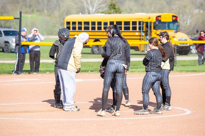 River View coach Willie Infante talks to his players during Wednesday's game with Philo, which won 20-4.
