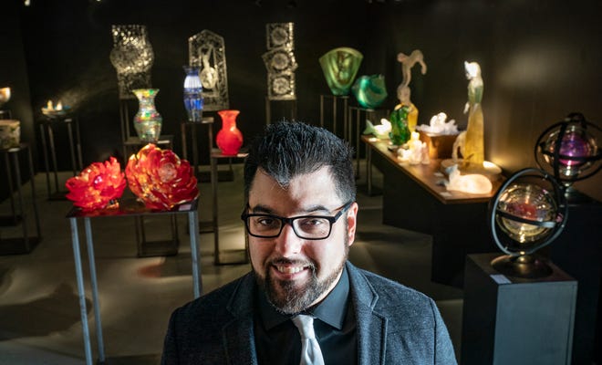Aaron Schey, co-owner of Habatat Galleries in Royal Oak, poses for a portrait in the gallery on Thursday, April 28, 2022. Habatat Galleries returns to in-person exhibits with its 50th annual International Glass exhibition coming Saturday, April 30, 2022, and it is open to the public. The gallery is the oldest and largest of its kind in the country and was recently passed down from Schey's father Ferdinand Hampson, to brothers Corey Hampson and Schey.