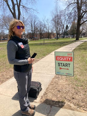 Amy Schaeuble, executive director of Greater Green Bay YWCA, plays the Game of Equity on Thursday, April 28, 2022 at Jackson Park. The game is part of the 2022 Stand Against Racism event that continues through Sunday, May 1.