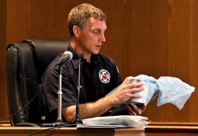 Lancaster Fire Department Investigator Jason Coy identifies evidence during the second day of Kenneth Dawson's arson trial April 27. Dawson is accused of setting fire to the Fraternal Order of Police Lodge in Lancaster in February 2021.