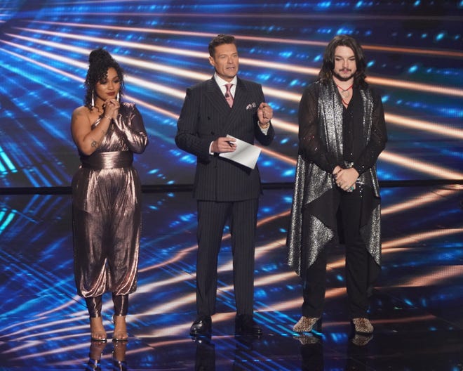From left, Lady K, American Idol host Ryan Seacrest, and Tristen Gressett during Monday's episode. Lady K and Gressett were in the bottom two after live voting, and were awaiting their fate. Judges picked Lady K to move forward into the top 10.