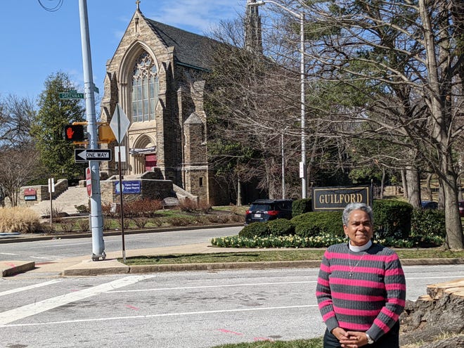 The Rev. Canon Christine McCloud of of the Episcopal Diocese of Maryland poses outside a cathedral in Baltimore, Maryland, in March 2022.