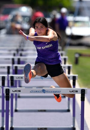Alyssa O'Malley of Merkel wins her heat in the Girl's 100-meter hurdles during Friday's UIL Region 1-3A Track & Field Championships at ACU.