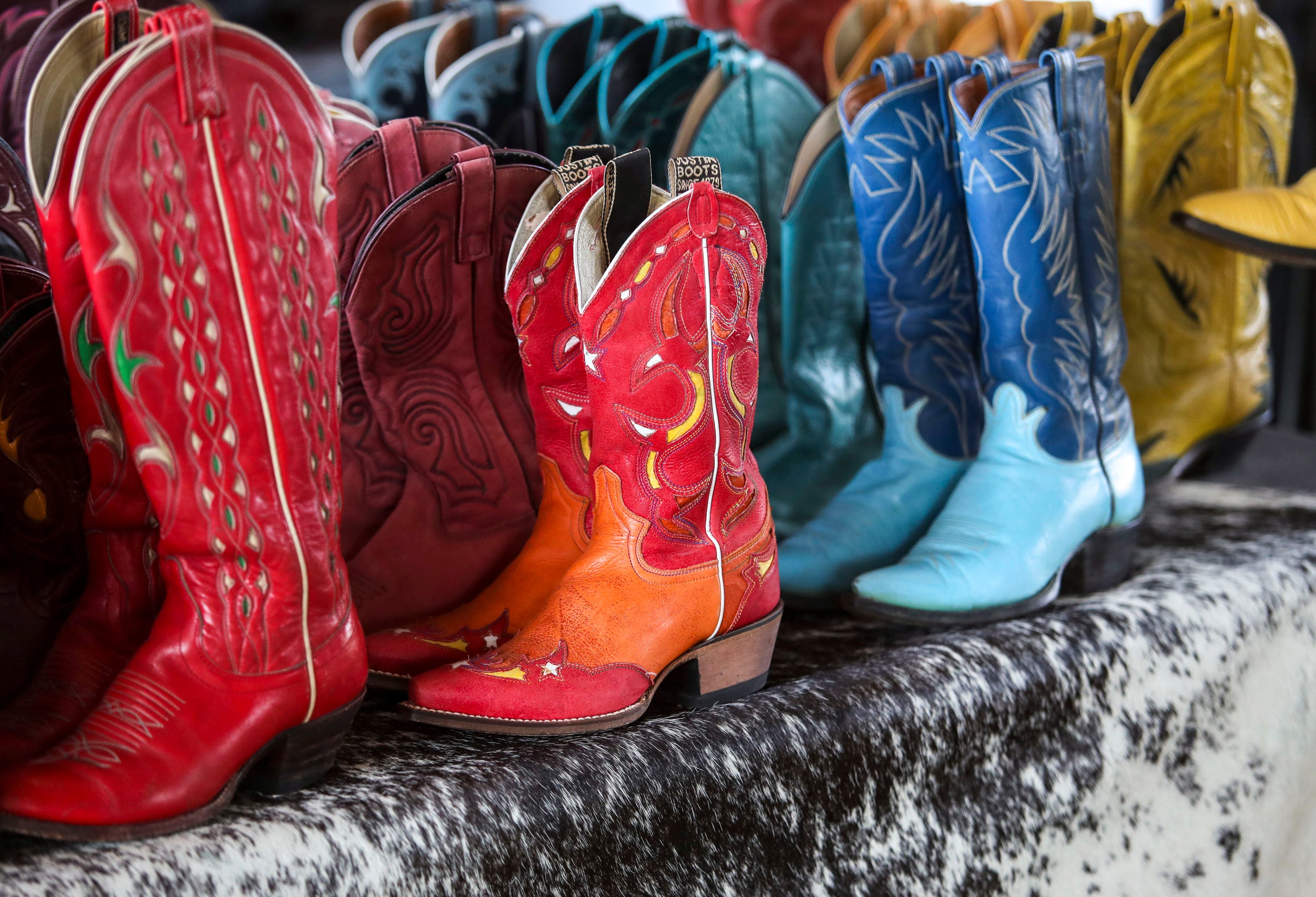 Cowboy boots are seen for sale at Nikki Lane's Stage Stop Marketplace during the Stagecoach country music festival in Indio, Calif., Friday, April 29, 2022.