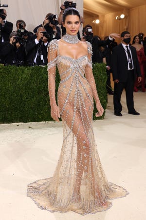 Gilded Glamour theme details, attendees, how to watch 1 Kendall Jenner glitters in a glamorous gown at the 2021 Met Gala on Sept. 13, 2021, in New York City.