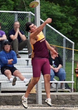Bloomington North’s Marcus Wynalda competes in the discus during the Conference Indiana track meet at North on Friday, April 29, 2022.