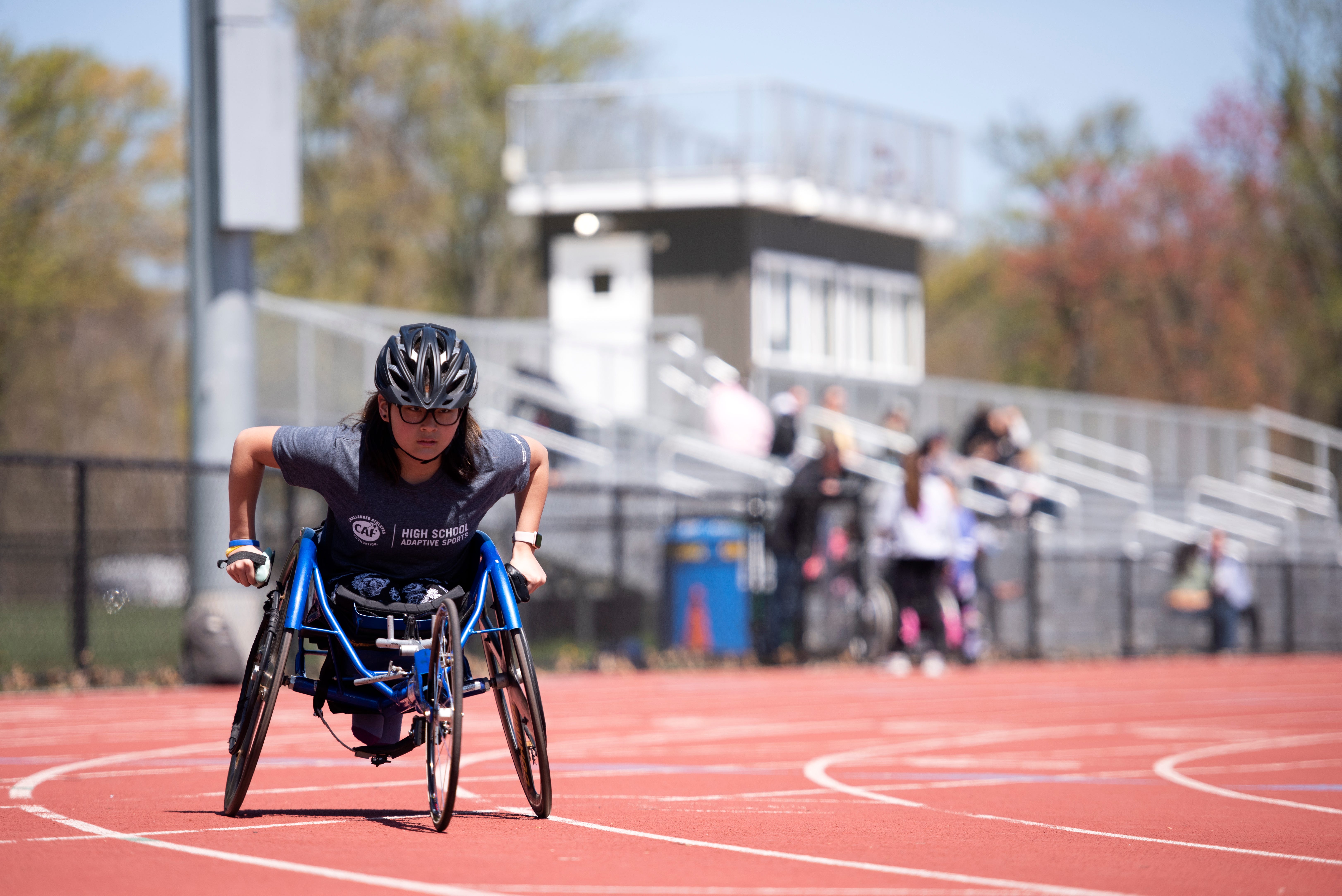 Mia Emory of Sayreville uses a racing wheelchair during a New Jersey Navigators practice on April 30, 2022 at Rahway River Park.