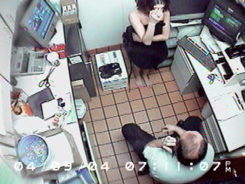 A Mount Washington McDonald's surveillance video entered into evidence shows a tearful Louise Ogborn covering her face as Walter Nix Jr. takes more orders from a caller identifying himself as "Officer Scott."
