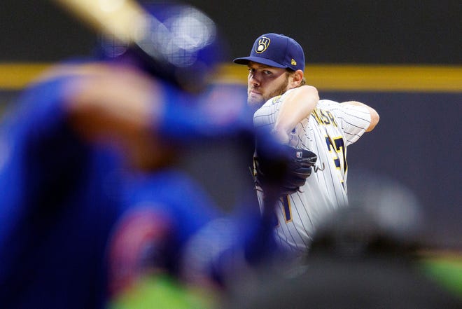 Brewers starting pitcher Adrian Houser threw six shutout innings of two-hit ball during his outing against the Cubs on Friday at American Family Field.
