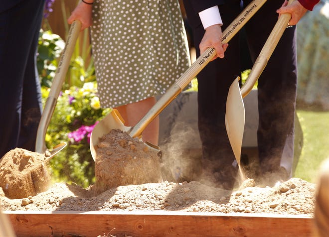 Members of The Church of Jesus Christ of Latter-day Saints help break ground on the new temple on April 30 in Farmington.