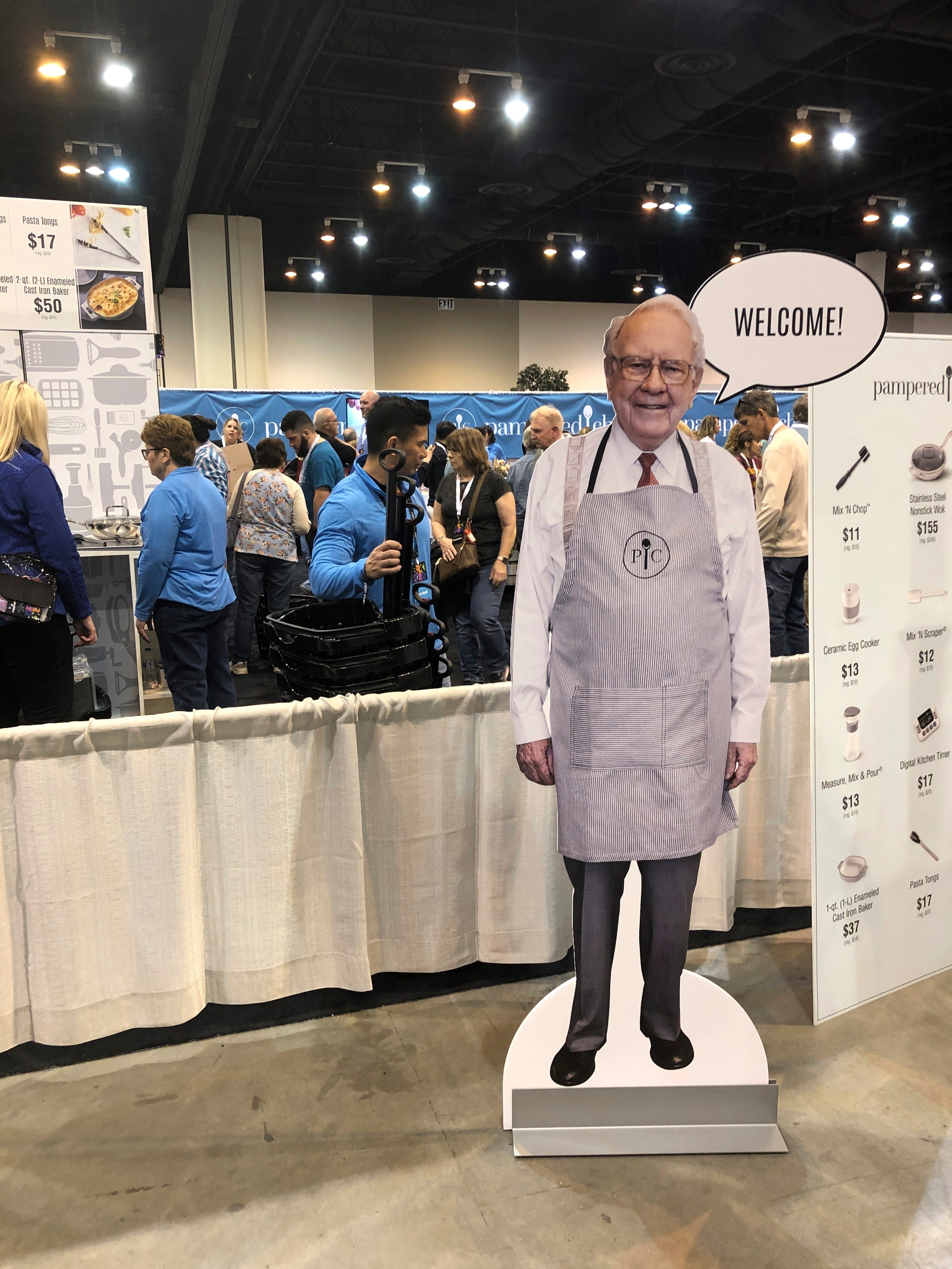 A cutout of Berkshire Hathaway CEO Warren Buffett greets shareholders at the Pampered Chef booth at the company