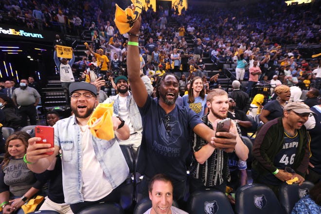 May 1, 2022;  Memphis, Tennessee, USA;  Memphis Grizzlies fans cheer as Golden State Warriors forward Draymond Green (23) is ejected during game one of the second round for the 2022 NBA playoffs at FedExForum.  Mandatory Credit: Joe Rondone-USA TODAY Sports
