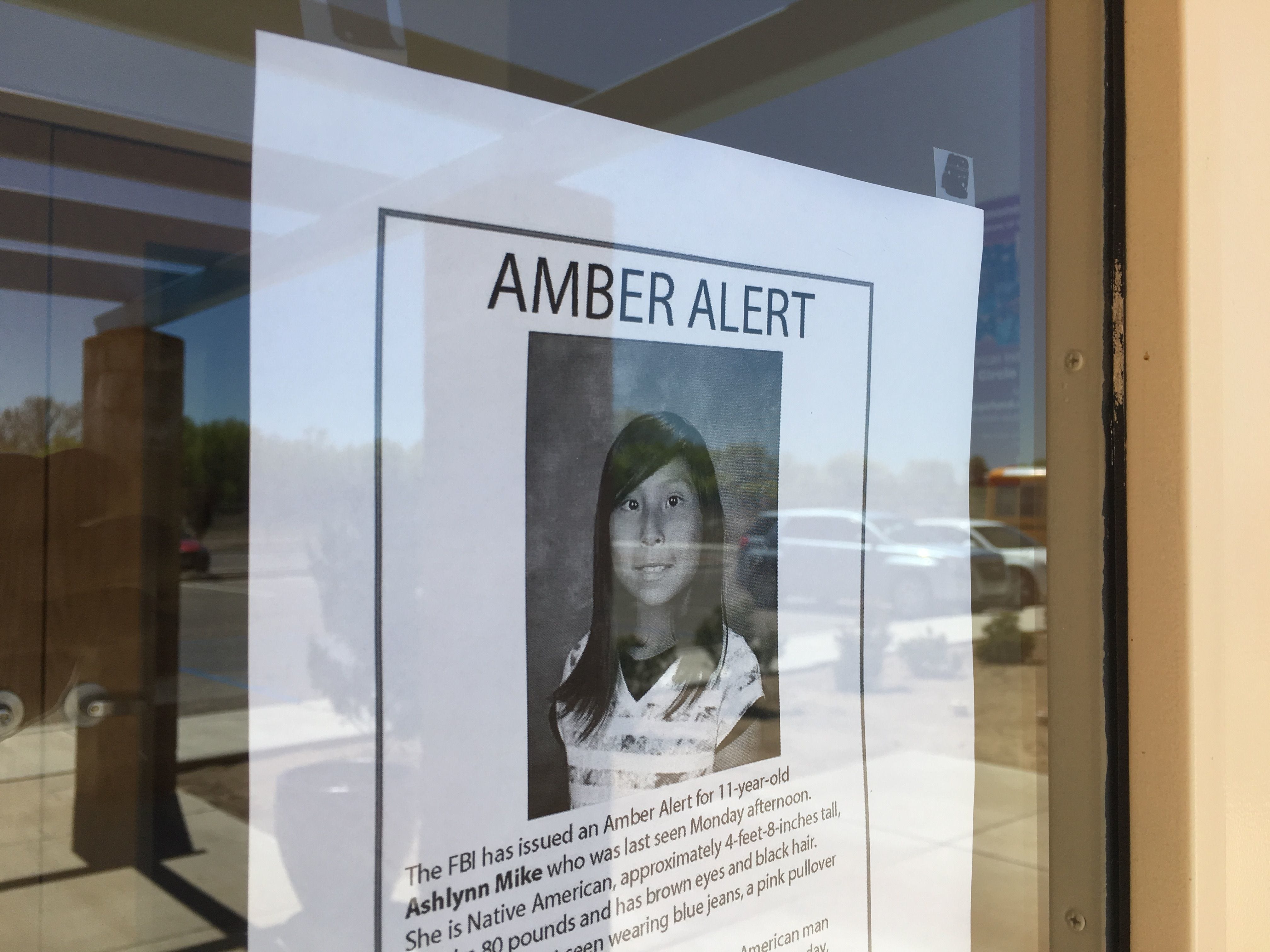 An Amber Alert poster for Ashlynne Mike is posted on May 3, 2016 at the entrance for the San Juan Chapter house in Lower Fruitland, New Mexico.