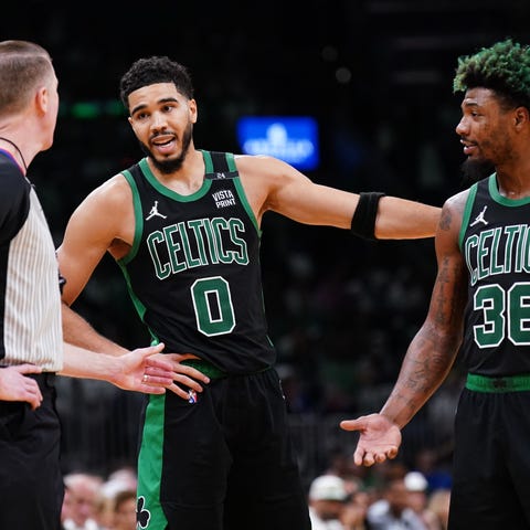 Boston Celtics forward Jayson Tatum (0) and guard 