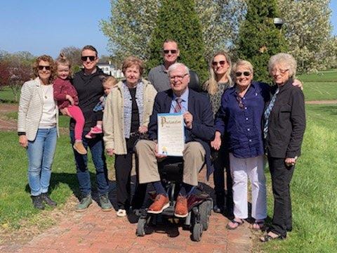 A ceremony was held April 29 to honor the contributions of Jack Peters and Charlie Grove to the Greater Alliance area. Family members, friends and community members were on hand for a tree-planting held in honor of the men. In attendance were, from left, Beth Grove Mitchell, Juna Mitchell, Chas Mitchell, Jane Mitchell, Madge Peters, Dave Mitchell, Alliance Mayor Alan Andreani, Brooke Rembert, Leigh Mainwaring and Carol Grove.