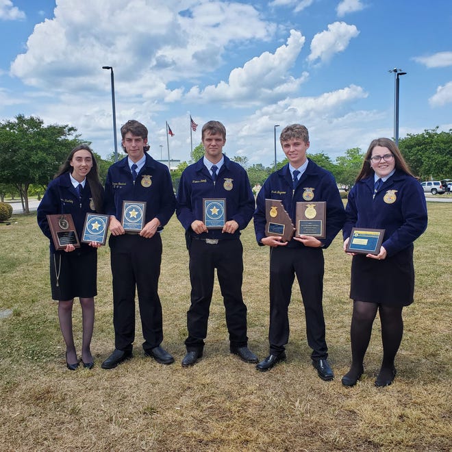 Screven County High School students Stormie Rackley (from left), Tanner Forehand, Thomas Dehoff, Creek Bazemore and Braelynn Hartley won awards at the Georgia FFA Convention, held April 27-30 in Macon.