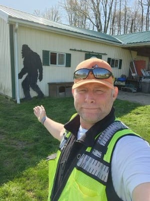 Kenny Mintz spots a Bigfoot in Byesville during his walk to raise awareness and funds for three charities.