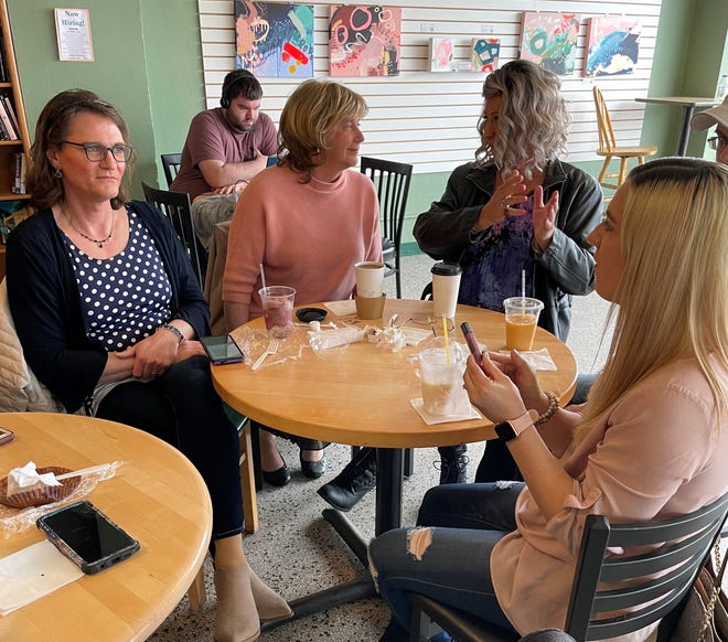 A group gathers at the Attic, 730 Bodart St., for a meet and greet as part of Green Bay's Trans Day of Visibility event on April 2.