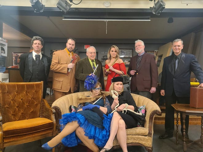 The cast of The Masquers' show Clue. Pictured from row, from left: Kathy Kowalski as Mrs. Peacock and Darcy Gravelle as Mrs. White. And back row, from left: Tim Brey as Wadsworth, Patrick Schamburek as Colonel Mustard, Warren Schmidt as Mr. Green, Corrie Skubal as Miss Scarlet, Paul Hacker as Professor Plum and Bruce Bitter as Mr. Boddy.