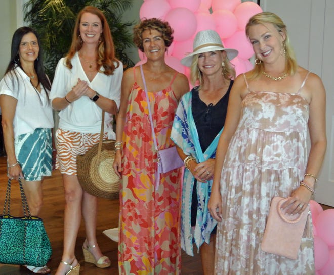 Sawgrass Women's Club members Lauren Daly (from left), Kim Fleischer, Dee Koutoufaris, Stacy Rendzio and Ana Reyes modeled Scout & Molly fashions at the club's annual fashion show luncheon.