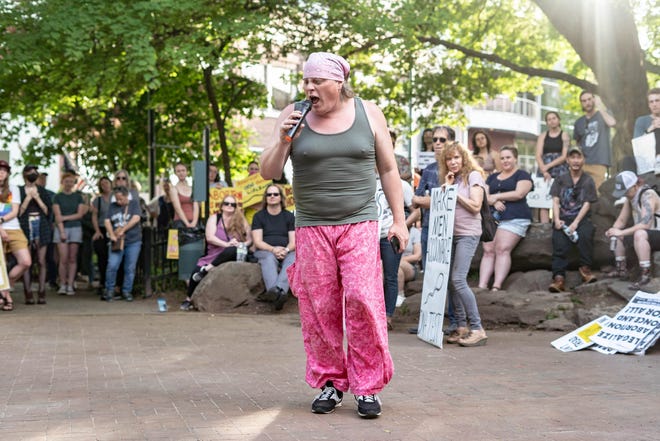 Activist Claire Clark spoke at an abortion-rights rally in downtown Asheville on May 3, 2022. "We have to stand up and fight back," Clark said.