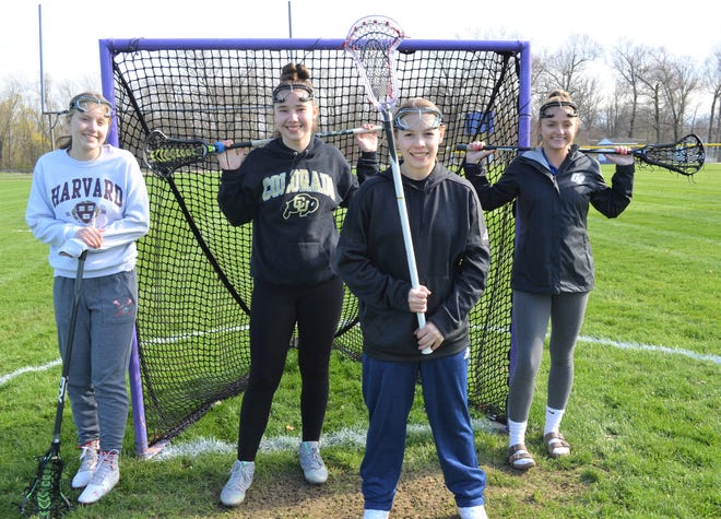 The Cereal City girls lacrosse team includes high school players from all the Battle Creek city  schools as well as Marshall and Vicksburg. From left, Logan Hutchinson, Hannah Eggleston, Aria Trayer and Lauren Yeck.