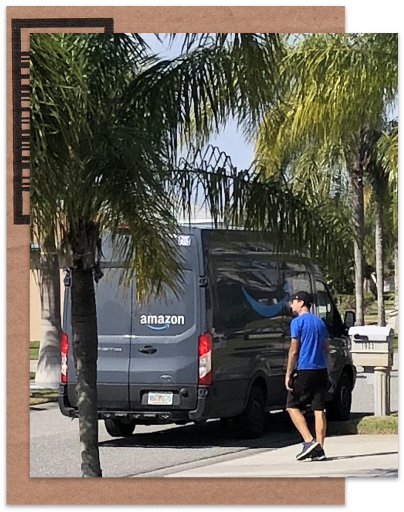 An Amazon driver returns to his vehicle after making a delivery in Viera.