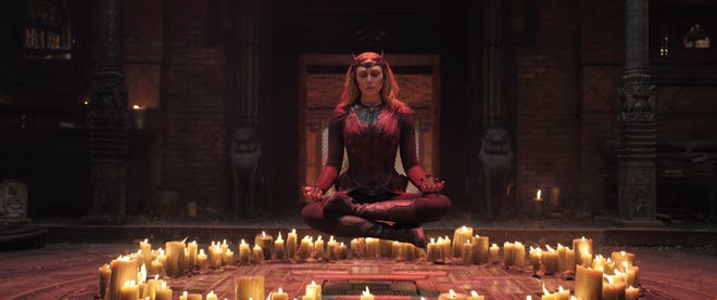 Powerful witch Wanda Maximoff (Elizabeth Olsen) is recruited to help a fellow magic-wielding superhero in "Doctor Strange in the Multiverse of Madness."