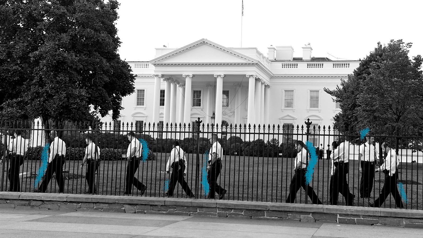 Uniformed Secret Service officers walk along the fence on the North side of the White House in Washington on Sept. 20, 2014. The Secret Service was boosting security outside the White House following an embarrassing security breach in which an intruder with a knife scaled the White House fence, dashed across the lawn and made it all the way inside before agents managed to stop him.