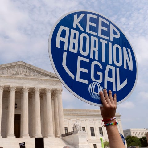 Abortion-rights supporters protest outside of the 