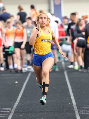 Wooster's Llana Tucker (pictured here at the Triway Invitational) won the 200 and was a member of the 400 and 800 relays that won against Ashland.