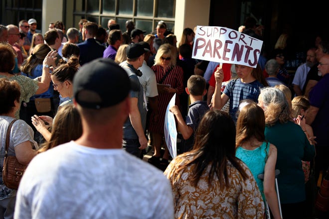 A crowd rallying outside the Duval County Public Schools office in May underscored competing views on how issues surrounding sexuality should be handled in classrooms.
