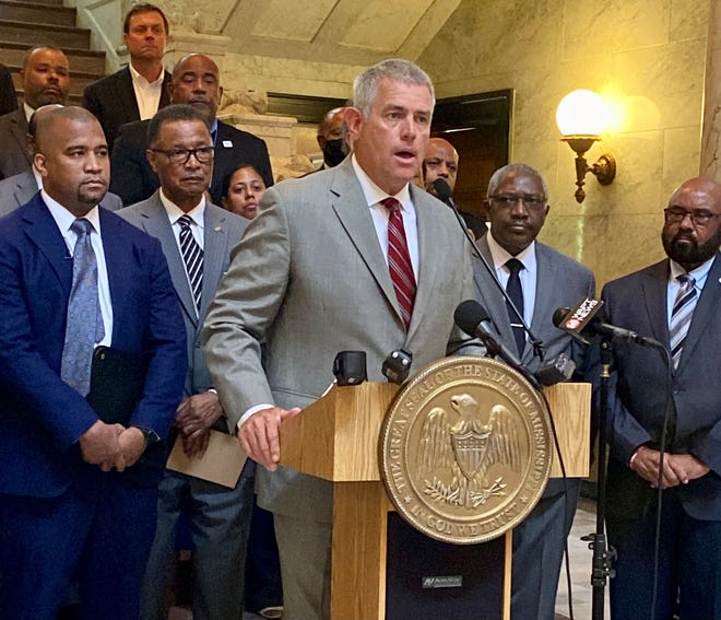 Speaker of the House Phillip Gunn address a press conference at the Capitol on Wednesday on reducing crime in Jackson and Hinds County.