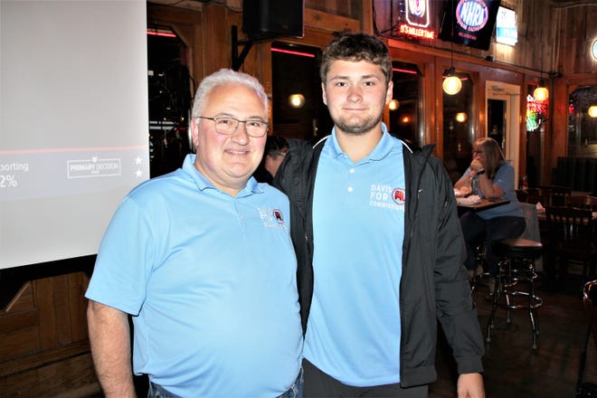 Dr. Mark Davis, left, leads incumbent Commissioner Ken Stiverson by 44 votes in the Republican Party primary election for a seat on the Marion County Board of Commissioners, according to the unofficial results released Tuesday, May 3, 2022. Davis, shown with his son Spencer during an election night function, received 2,722 votes in the primary while Stiverson received 2,678 votes. Marion City Councilman Jason Schaber received 1,101 votes.
