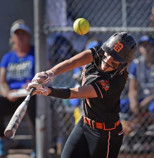 Douglas' Haley Wilkinson takes a swing at the ball during Tuesday's game against McQueen at McQueen High School on May 3.